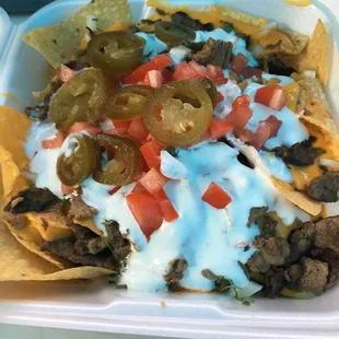 come out and try our delicious regular and supreme nachos!!