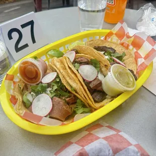 Lengua and carnitas tacos