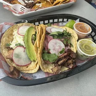 Pescado and beef brisket tacos