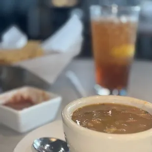 a bowl of soup and a spoon