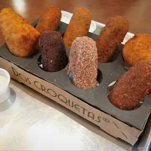 Dos Croquetas 12/27/20:  Ham, 305, Mac + Cheese + Bacon, Medianoche, Mexican Street Corn, Guava, Oreo, Arroz con Leche Croquetas