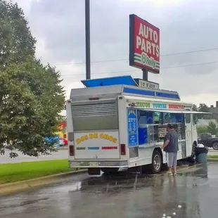 a food truck on a rainy day