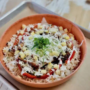 a bowl of rice and vegetables
