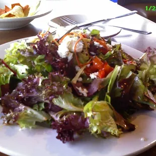 Adobe Salad - greens with goat cheese, red peppers and orange chipotle dressing