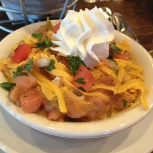 Four Corners Bean con Queso (Blend of Cheeses, Tomatoes, Leeks &amp; Green Chili, Pinto Beans. Pico De Gallo &amp; Sour Cream), $5.95