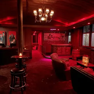 a dimly lit room with red lighting
