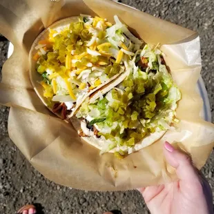Chipotle Chicken and Beef Barbacoa tacos. Not quite their usual presentation, but still quite tasty.