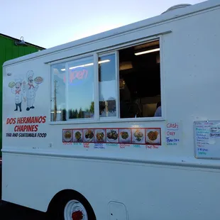 Food truck with menu below the window. Cash only!