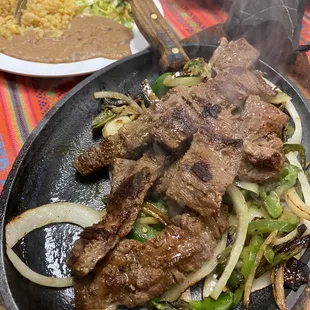 Carne Asada on sizzling plate