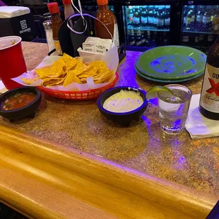 Chips, salsa and ranch dip.