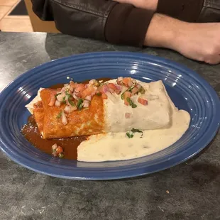 Burrito loco. Steak chicken and shrimp With cheese ranchero sauce in it!!