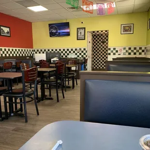 Great Mexican music videos on the wall.