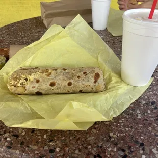Bacon breakfast burrito and large lemonade