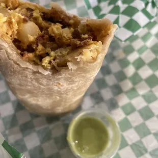 Chorizo burrito and green salsa