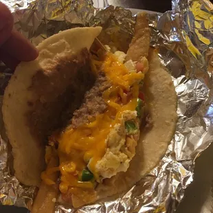 Chilaquiles w beans on corn