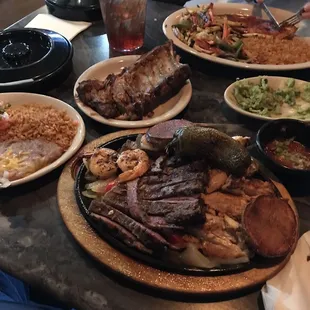 a table full of plates of food