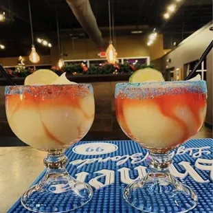 From their Facebook: United States of Texas Margarita, its all fresh juice (lime and orange) and patron, grand mariner, and agave.