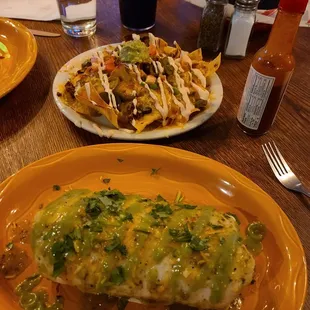 Steak burrito and half shredded chicken nachos