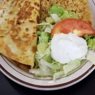 Quesadilla Azteca (cheese, mushrooms, and chorizo) for him.