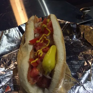 a hot dog with mustard and ketchup