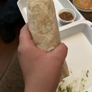 The burrito is the size of of my hand and very skinny