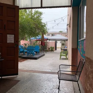 Back patio area...love sitting under the trees with a good book!