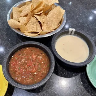 Complimentary delicious queso with tasty homemade salsa