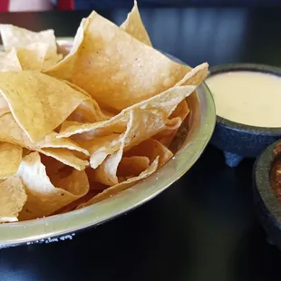 Complimentary chips, salsa, and queso (first cup only). Delicious!