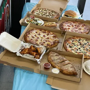 Chicken wings Calsone tortas and hotdogs