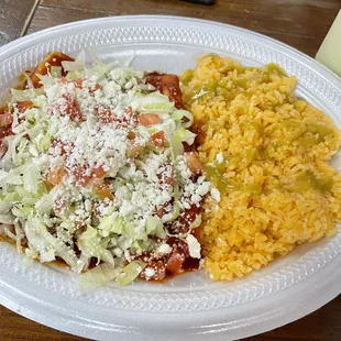 Red enchiladas with cheese. 10/10 great flavors and nice cool atmosphere.