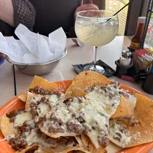 Beef nachos with house margarita