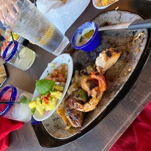 What remains of my Mixed grill fajitas and house margarita