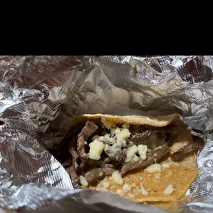 Carne asada taco on what tasted like a homemade tortilla. Great flavor, no fat.