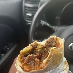 Savory birria burrito with beans and cheese!