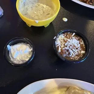 Cheese dip, side of sour cream and side of pinto beans.