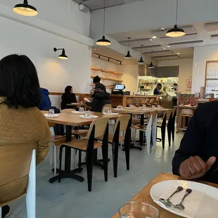 a woman sitting at a table