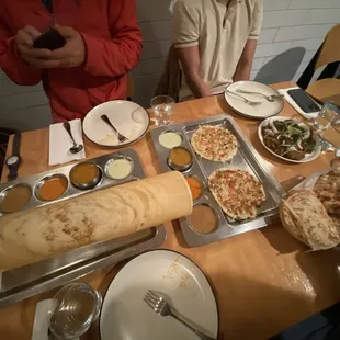 Chicken Tikka Dosa, veggie uttapam, and Mutton Sukka with Parota