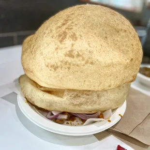 Perfectly round balls of fried dough - goodness at its best! Chole Bhatura