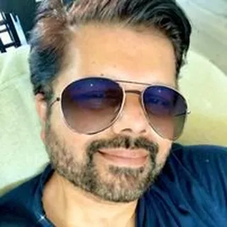 Ajay I.