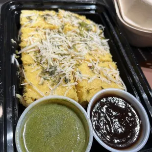 Dokla with mint chutney and tamarin chutney