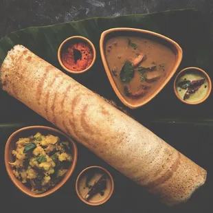 a plate of food and bowls