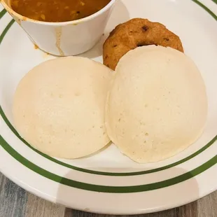 a bowl of soup and a plate of food