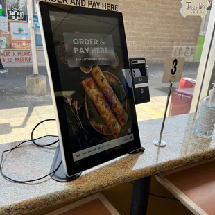 order and pay here sign
