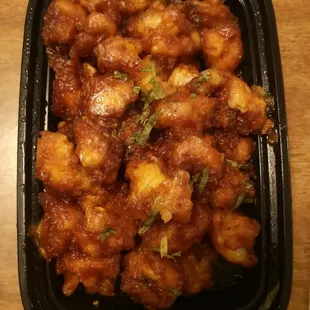 Gobi Manchurian - Vegan - $9.99. Fried Cauliflower in a sweet and tangy sauce