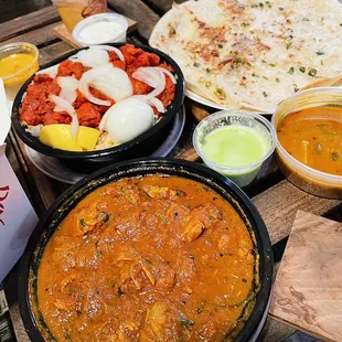Masala Chai, Onion Chilli Uthappam (top right) Hyderabad Special Chicken Biryani (left center) Madras Chicken Curry (Gf, Nf, Df) (bottom)