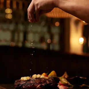 BONE-IN TOMAHAWK RIBEYE sous vide, grilled to order, jalapeño chimichurri, foyat