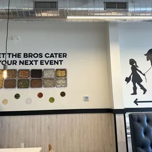 a woman standing in front of a sign