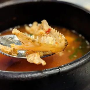 Spicy fish soup that came with my Chef&apos;s Special ($40). This soup contained a variety of vegetables and a fish head. Delicious, hot broth.