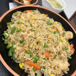 a plate of rice and vegetables