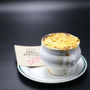 a cup of food on a saucer